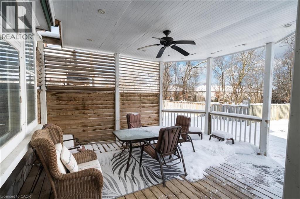 Snow covered deck featuring a ceiling fan and outdoor dining area - 184 Weber Street E, Kitchener, ON - Outdoor With Deck Patio Veranda With Exterior