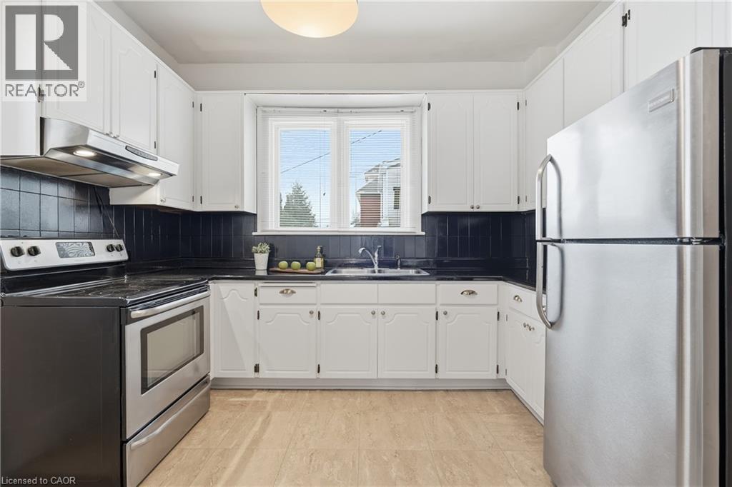110 Houghton Avenue S, Hamilton, ON - Indoor Photo Showing Kitchen With Double Sink