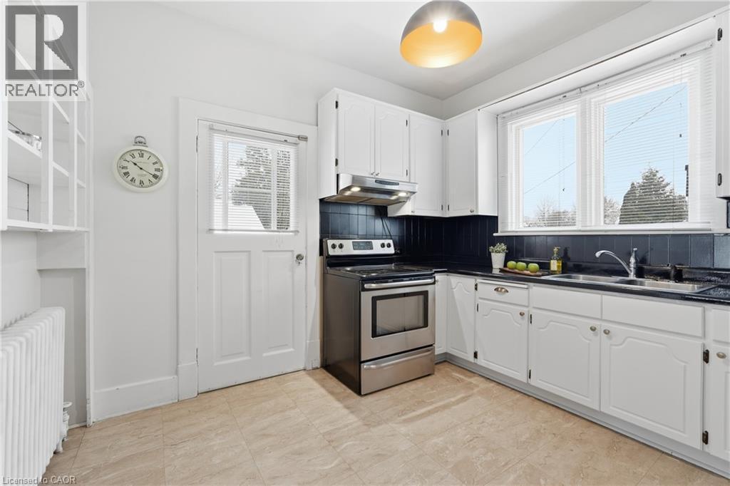 110 Houghton Avenue S, Hamilton, ON - Indoor Photo Showing Kitchen With Double Sink