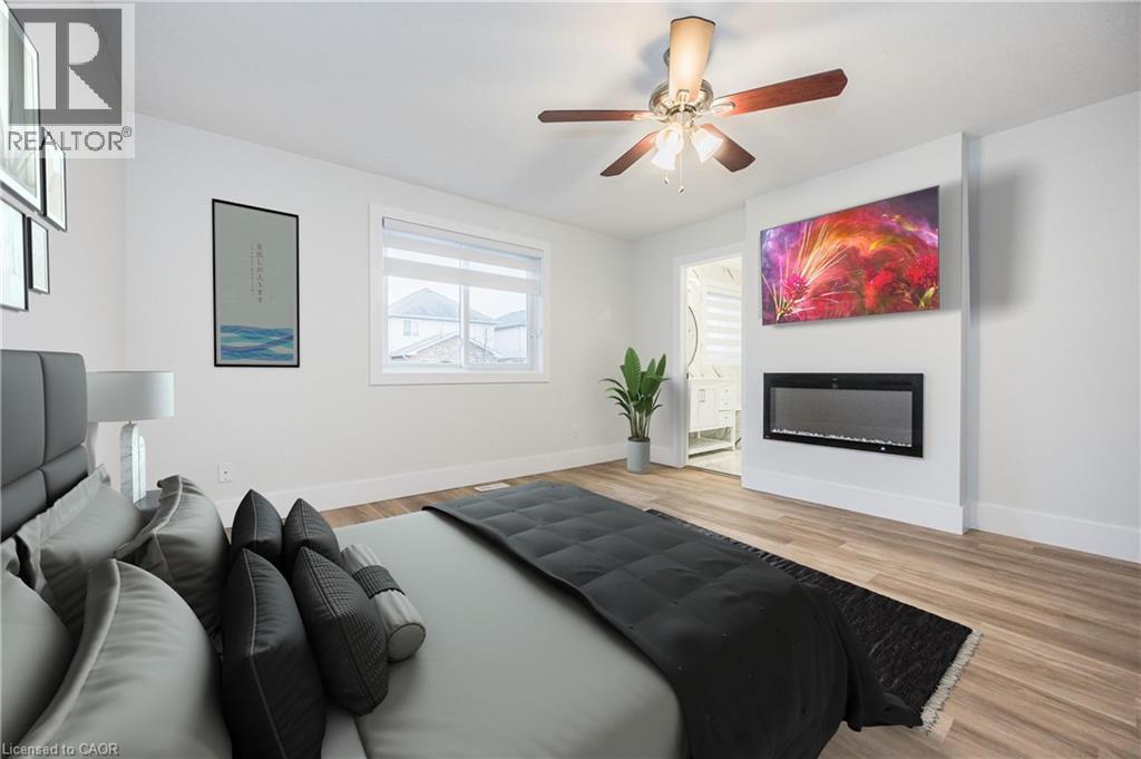 125 Steepleridge Street, Kitchener, ON - Indoor Photo Showing Living Room With Fireplace
