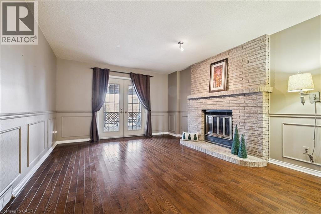 10 Finch Place, Hamilton, ON - Indoor With Fireplace