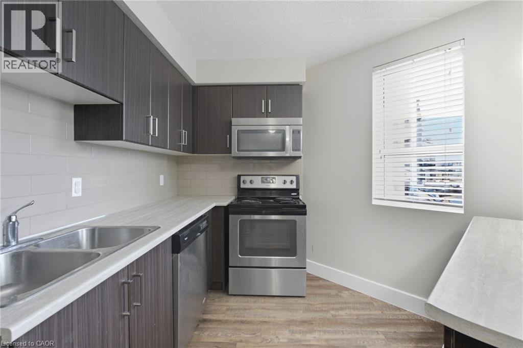 149 Main Street W Unit# 607, Hamilton, ON - Indoor Photo Showing Kitchen With Double Sink