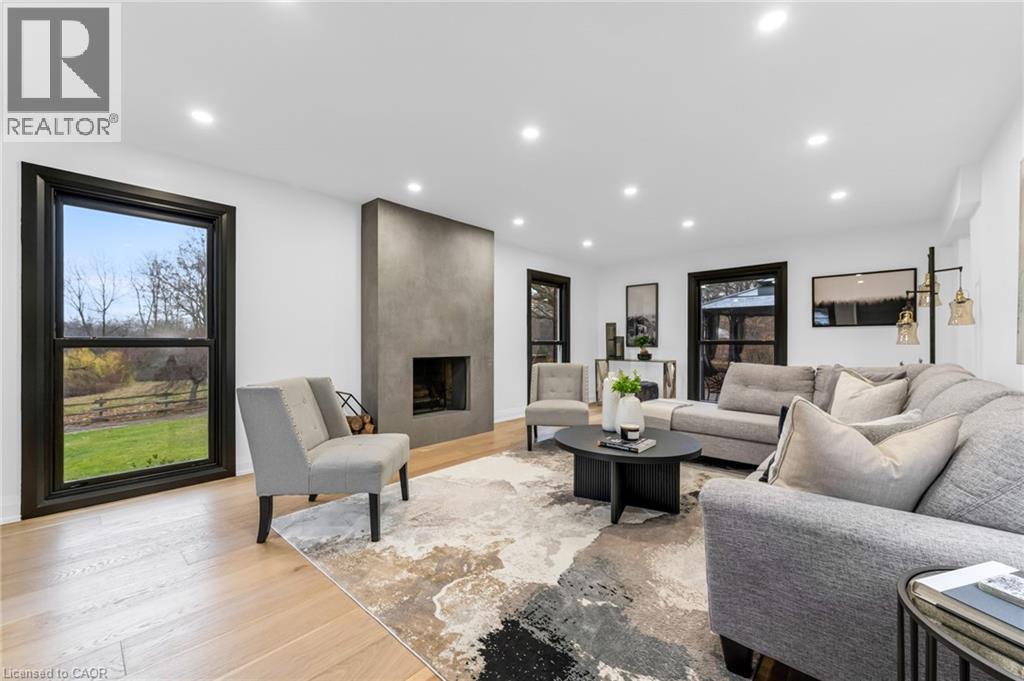 4344 No 1 Side Road, Burlington, ON - Indoor Photo Showing Living Room With Fireplace