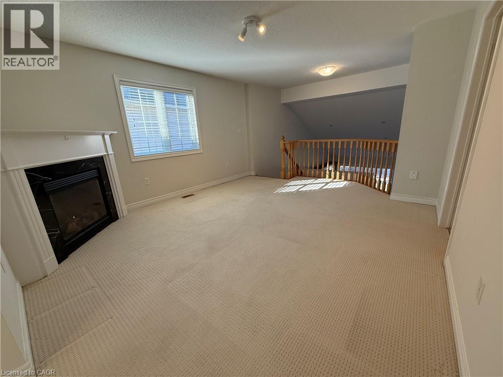 4210 Saunders Crescent, Burlington, ON - Indoor Photo Showing Other Room With Fireplace