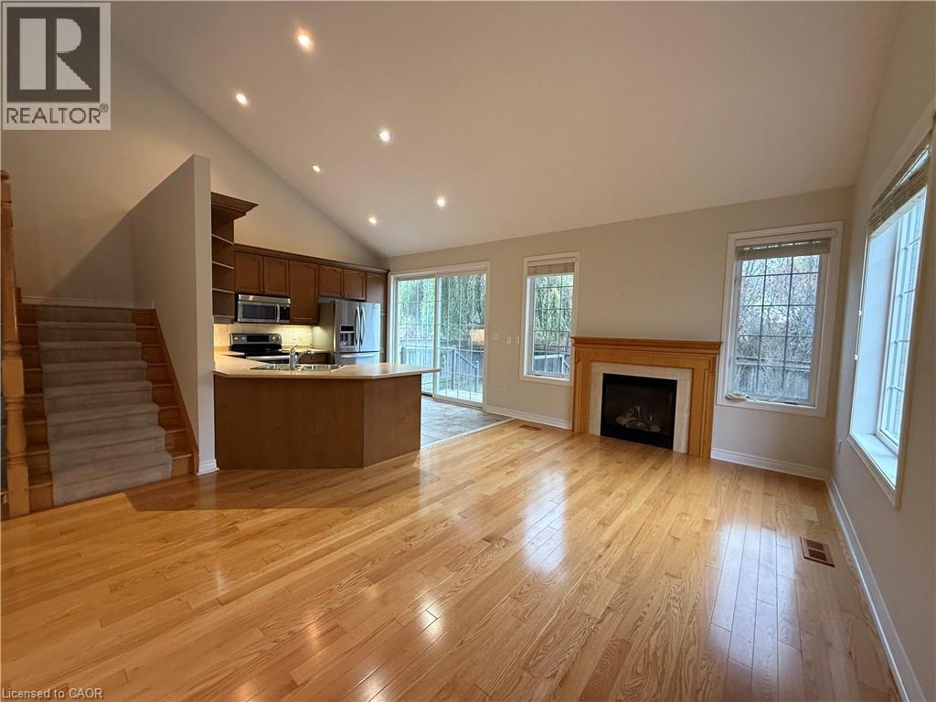 4210 Saunders Crescent, Burlington, ON - Indoor Photo Showing Living Room With Fireplace