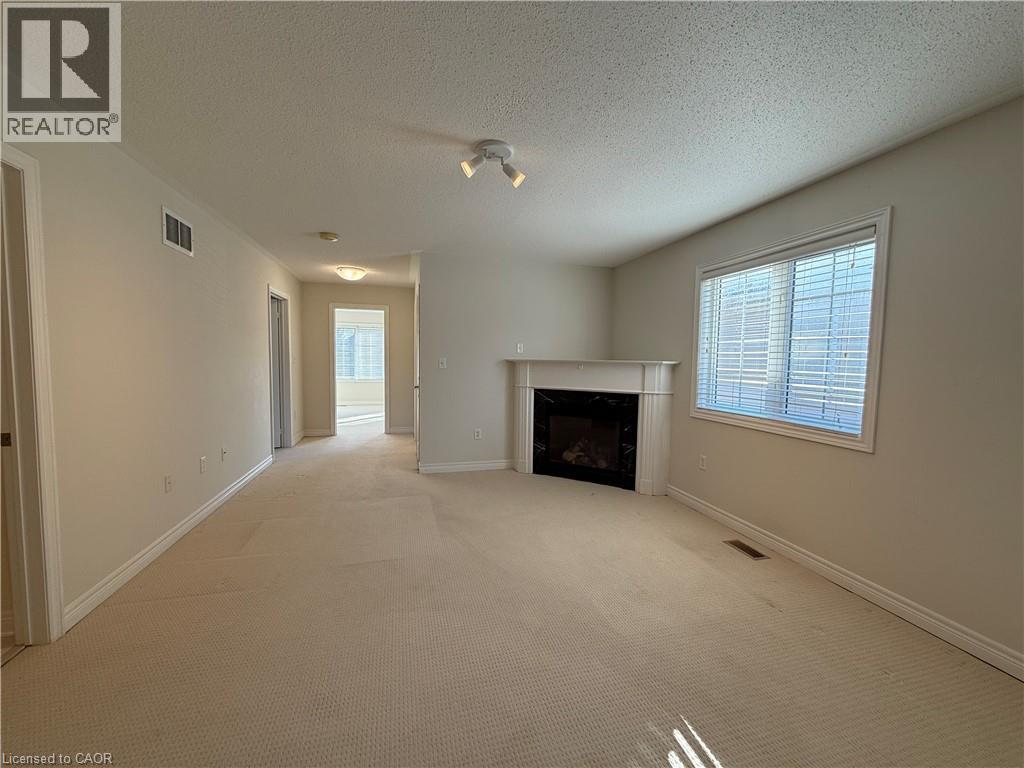 4210 Saunders Crescent, Burlington, ON - Indoor Photo Showing Living Room With Fireplace