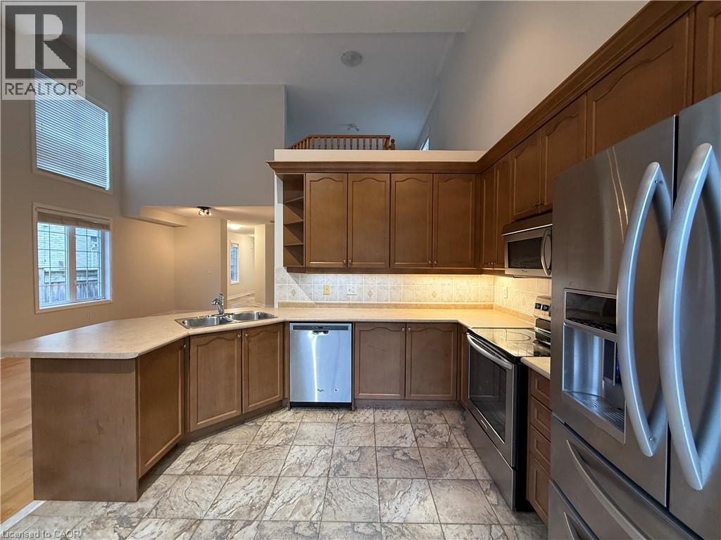 4210 Saunders Crescent, Burlington, ON - Indoor Photo Showing Kitchen With Stainless Steel Kitchen With Double Sink