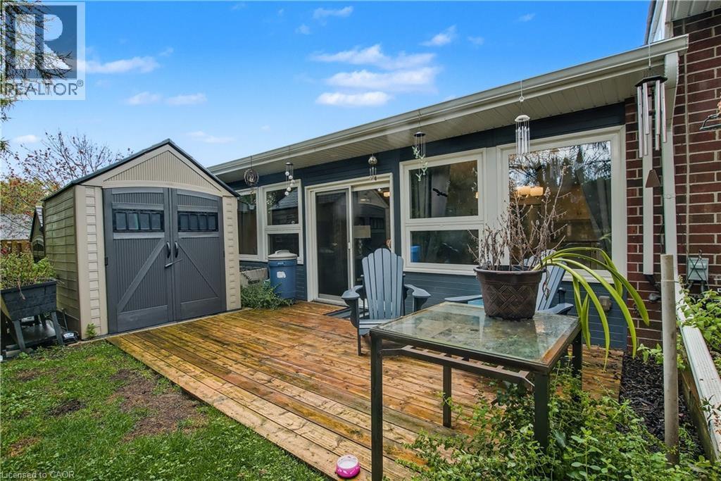 Wooden terrace featuring a shed - 47 Bishop Reding Trail, Hamilton, ON - Outdoor
