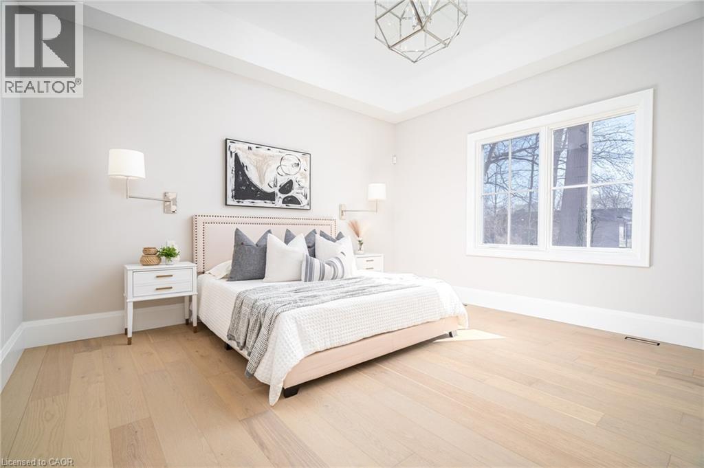 Bedroom with baseboards and hardwood / wood-style floors - 1322 Minaki Road, Mississauga, ON - Indoor Photo Showing Bedroom