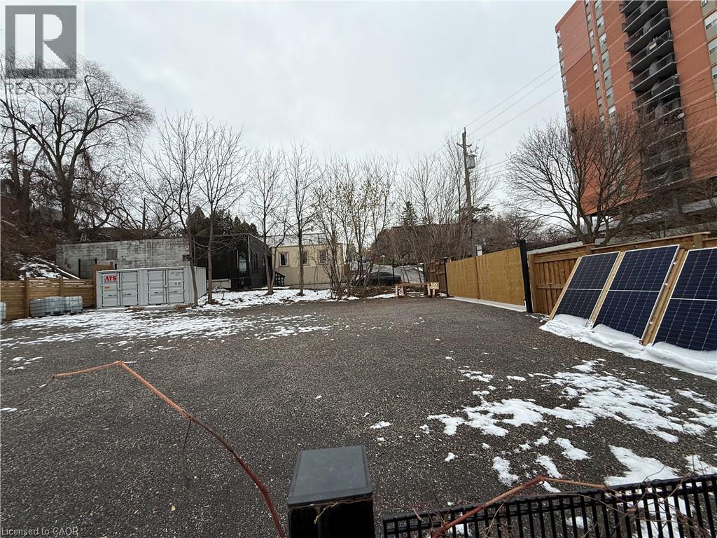 View of snowy yard - 43 Glen Road, Hamilton, ON
