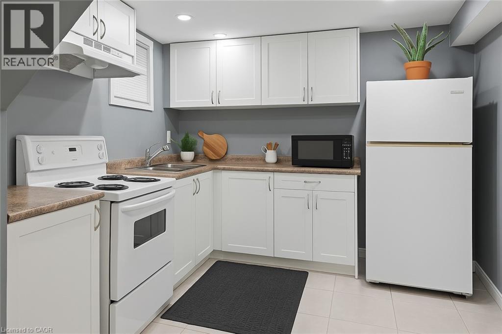 basement - 46 Delena Avenue S, Hamilton, ON - Indoor Photo Showing Kitchen With Double Sink