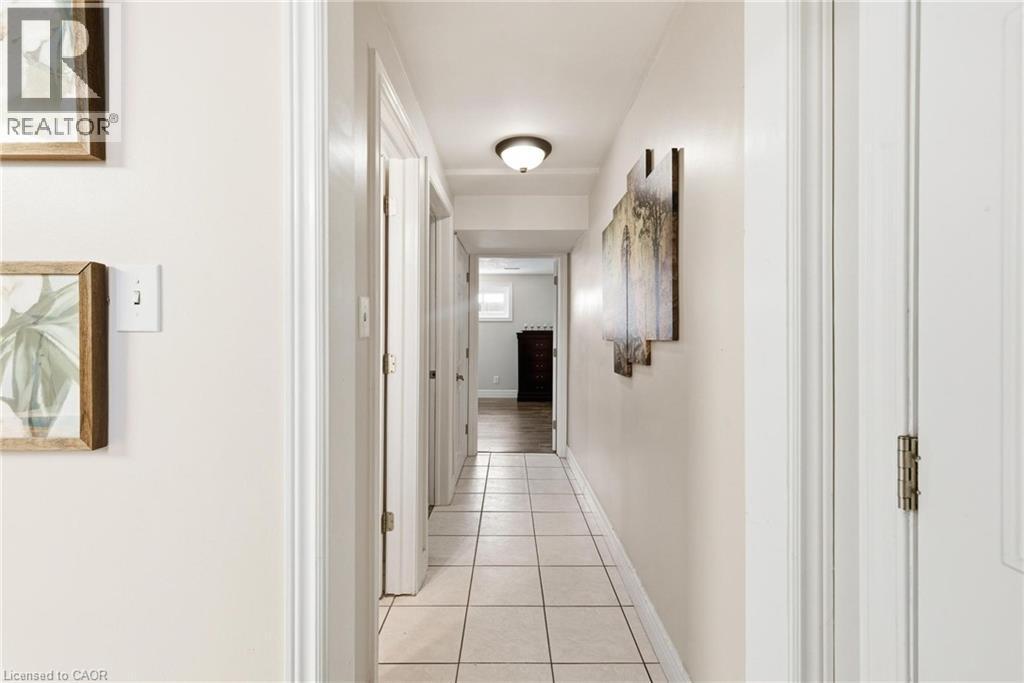 Hallway with light tile patterned flooring and baseboards - 364 Roselawn Place, Waterloo, ON - Indoor Photo Showing Other Room