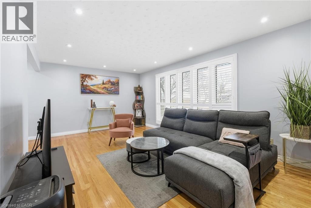 Living room with light wood-type flooring and recessed lighting - 364 Roselawn Place, Waterloo, ON - Indoor Photo Showing Living Room