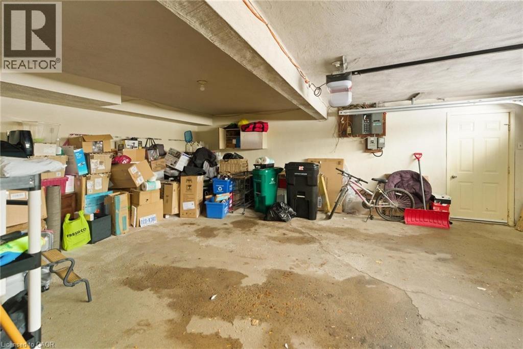 Garage featuring a garage door opener - 364 Roselawn Place, Waterloo, ON - Indoor Photo Showing Garage