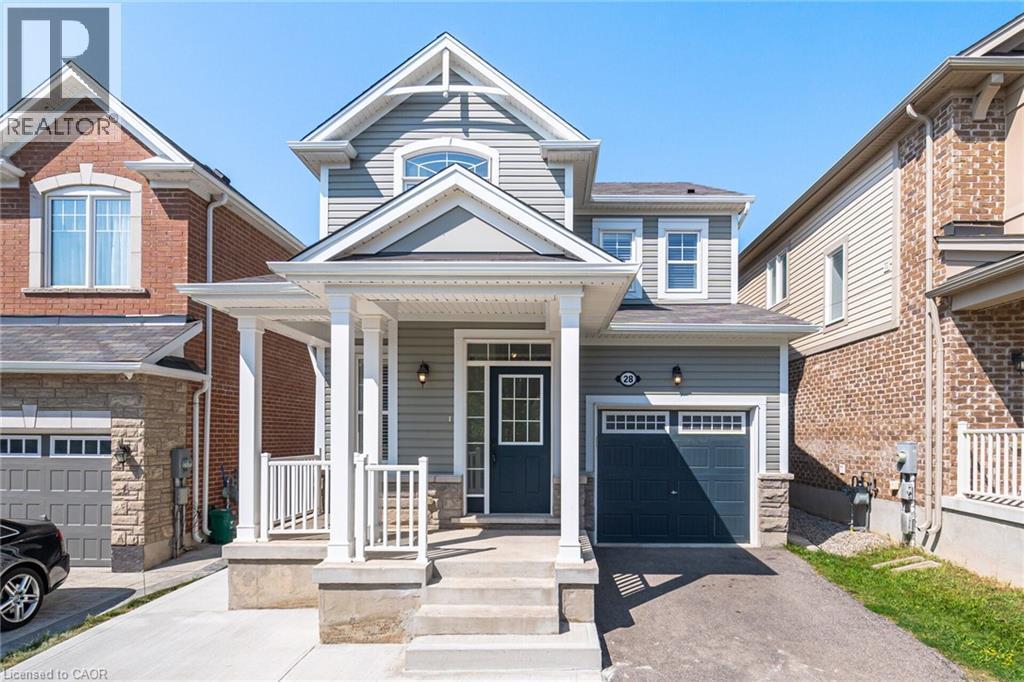 View of front of property with covered porch, asphalt driveway, a garage, and a shingled roof - 28 Pickett Place, Cambridge, ON - Outdoor With Facade