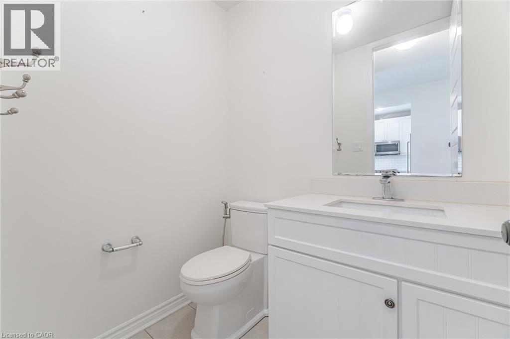 Bathroom featuring light tile patterned flooring and vanity - 28 Pickett Place, Cambridge, ON - Indoor Photo Showing Bathroom