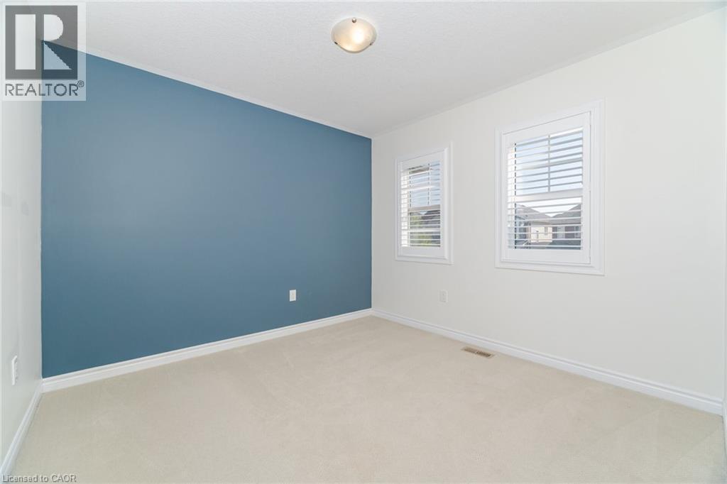 Unfurnished room with carpet flooring and baseboards - 28 Pickett Place, Cambridge, ON - Indoor Photo Showing Other Room
