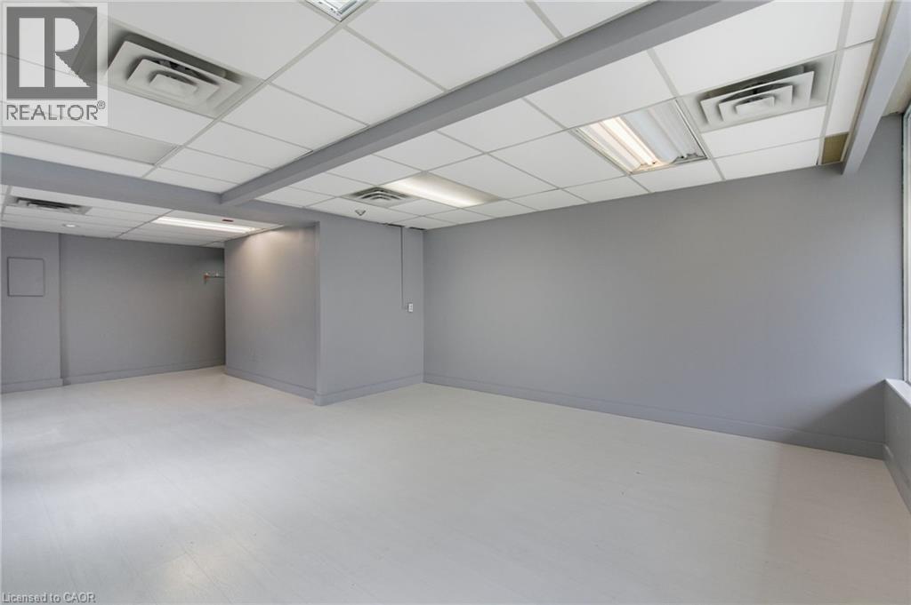 Unfurnished room with baseboards - 17 King Street E Unit# 205, Dundas, ON