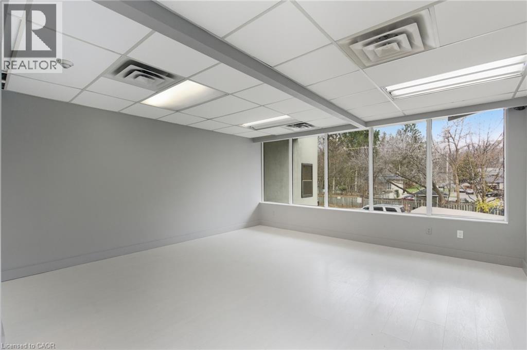Spare room featuring a drop ceiling - 17 King Street E Unit# 205, Dundas, ON