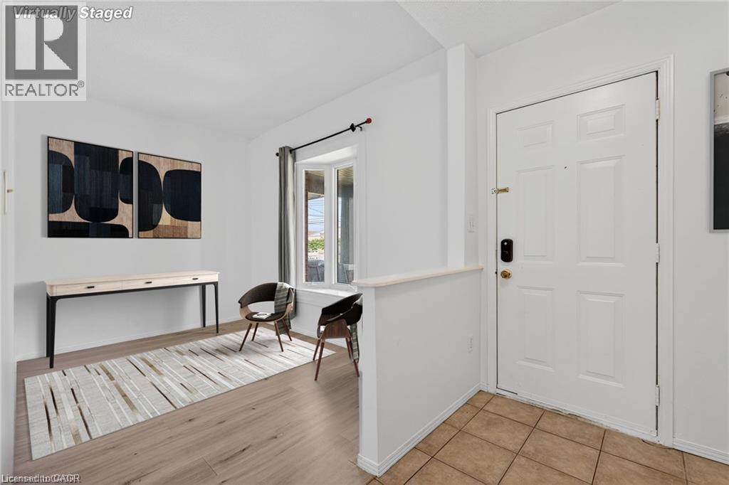 Entryway with light tile flooring - 111 Hillyard Street, Hamilton, ON - Indoor Photo Showing Other Room