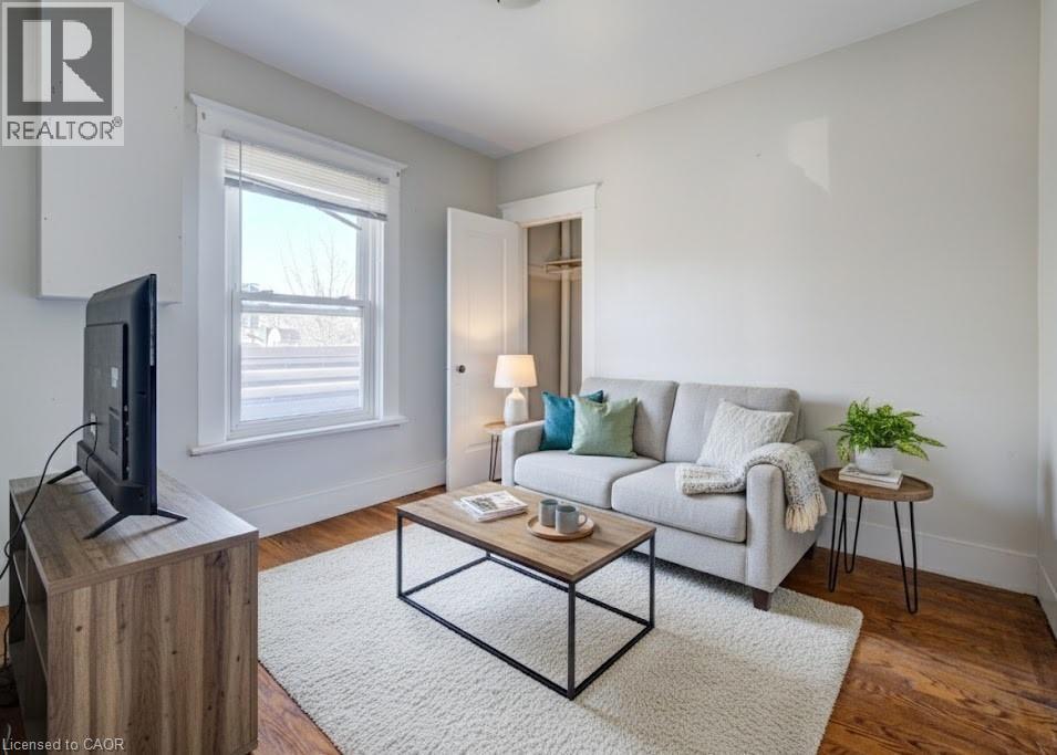 Digitally Altered Photo - 698 King Street W, Kitchener, ON - Indoor Photo Showing Living Room