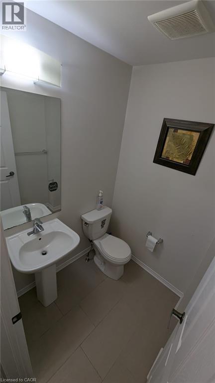 Full bath featuring vanity, a stall shower, and light tile patterned flooring - 19 Cromarty Avenue, Caledonia, ON - Indoor Photo Showing Bathroom