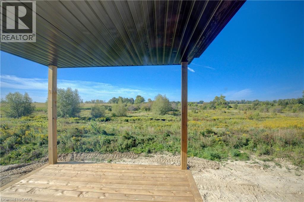 Optional covered deck upgrade - 117 Thackeray Way, Harriston, ON - Outdoor With Deck Patio Veranda With View