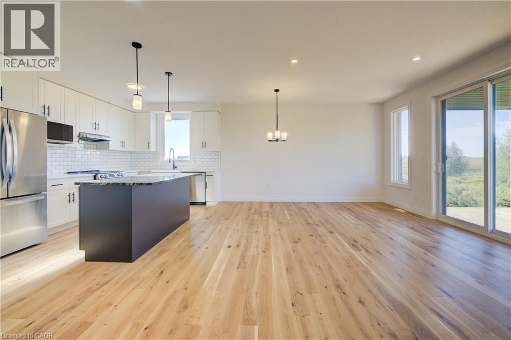 117 Thackeray Way, Harriston, ON - Indoor Photo Showing Kitchen With Upgraded Kitchen