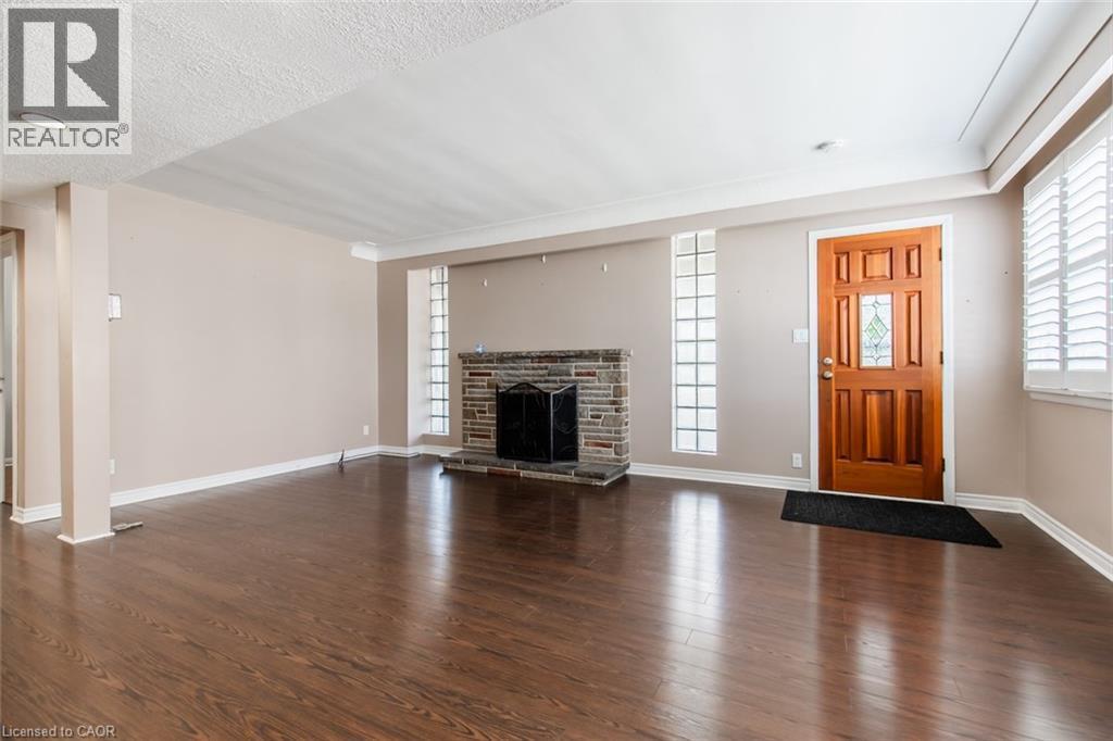 2340 King Street E, Hamilton, ON - Indoor Photo Showing Living Room With Fireplace
