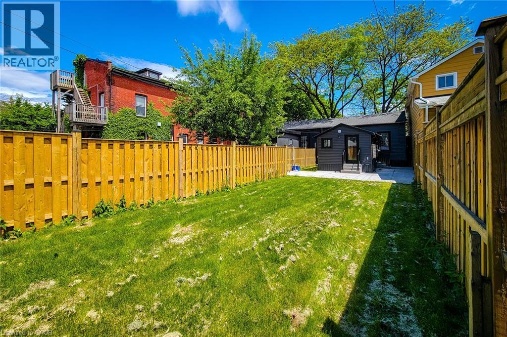Fenced backyard with a patio - 51 West Avenue N, Hamilton, ON - Outdoor
