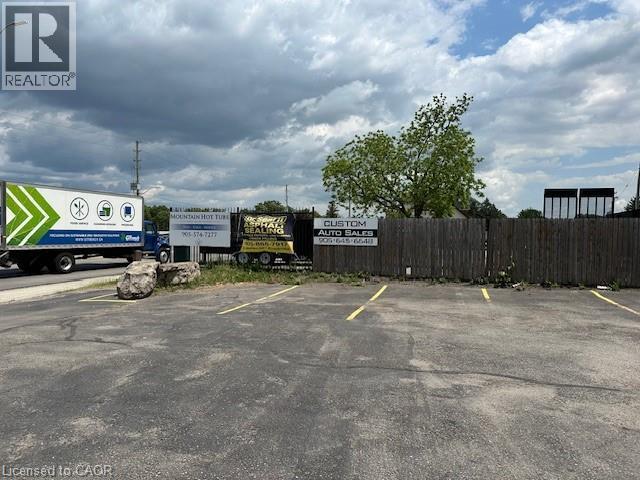 View of uncovered parking lot - 1360 E Rymal Road E, Hamilton, ON