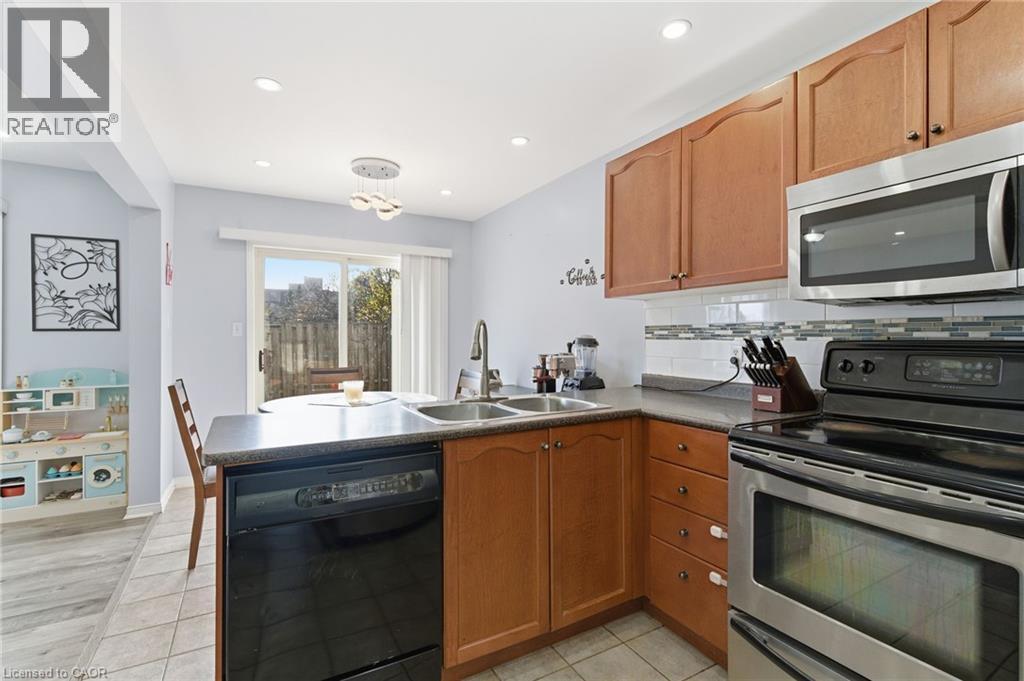 2 Racalmuto Street, Hamilton, ON - Indoor Photo Showing Kitchen With Double Sink