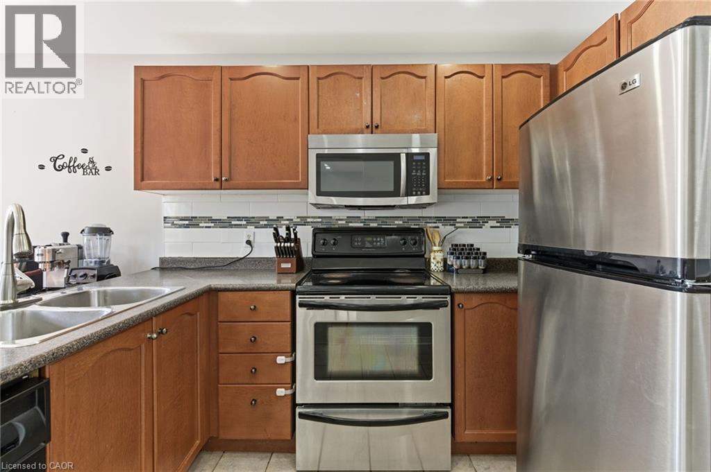2 Racalmuto Street, Hamilton, ON - Indoor Photo Showing Kitchen With Double Sink