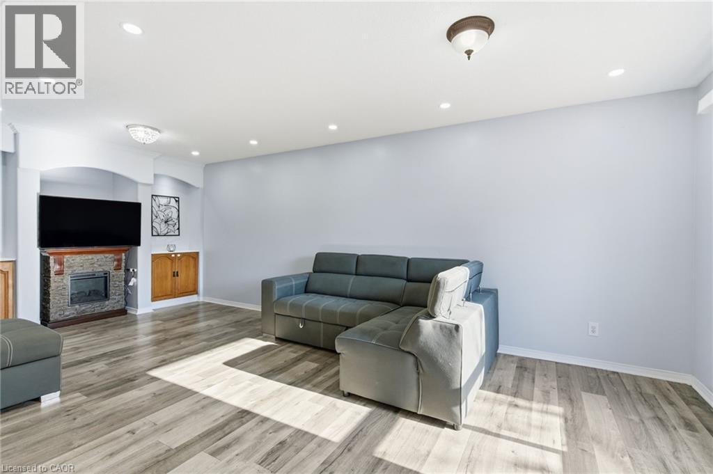 2 Racalmuto Street, Hamilton, ON - Indoor Photo Showing Living Room With Fireplace
