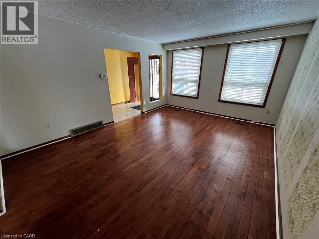 Hardwood floors - 185 Lavina Crescent, Hamilton, ON - Indoor Photo Showing Other Room