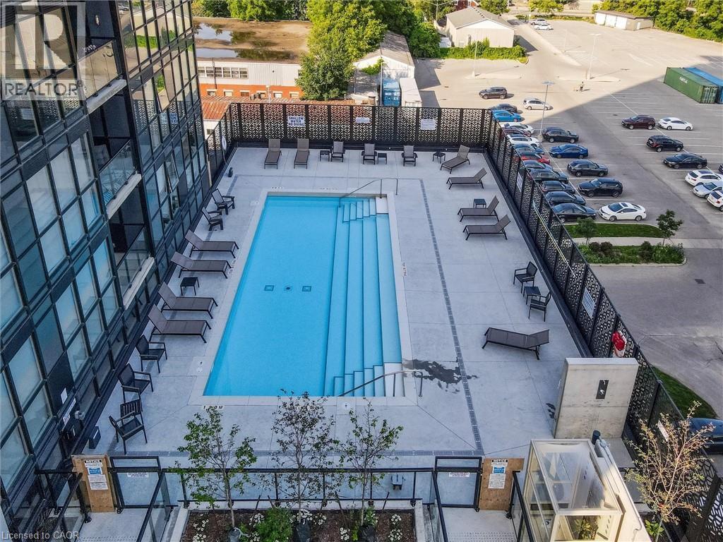 108 Garment Street Unit# 416, Kitchener, ON - Outdoor With In Ground Pool