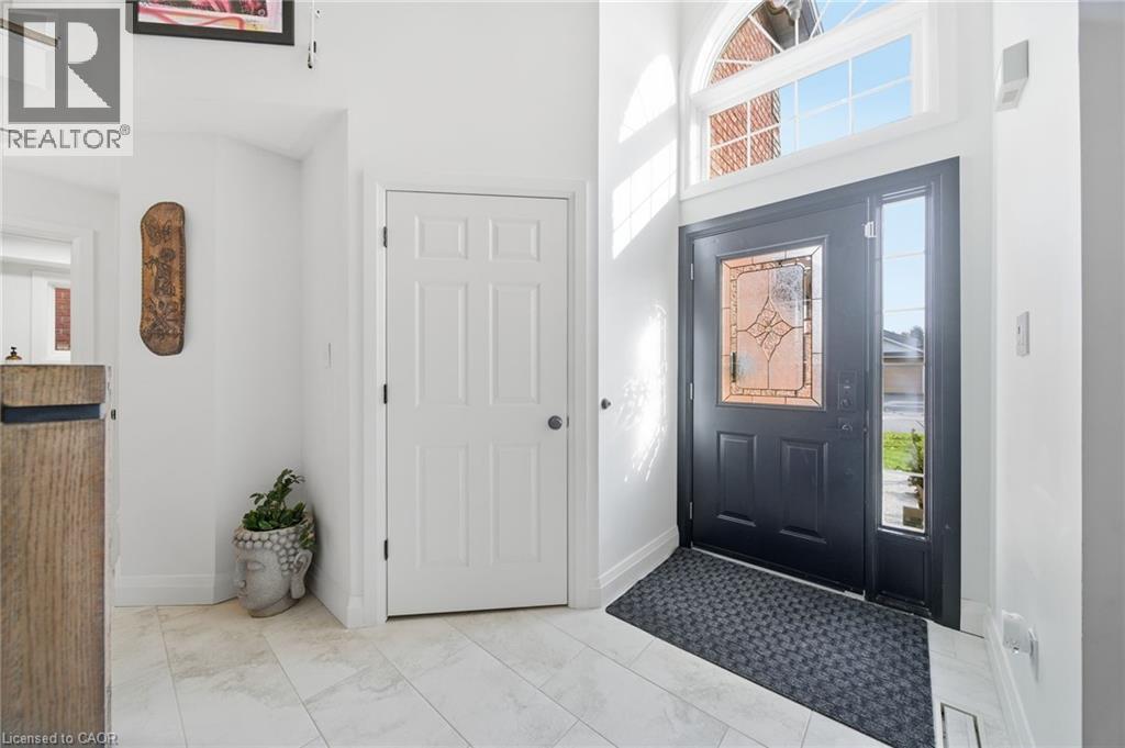 Entryway with a high ceiling and baseboards - 136 Braemar Avenue, Caledonia, ON - Indoor Photo Showing Other Room