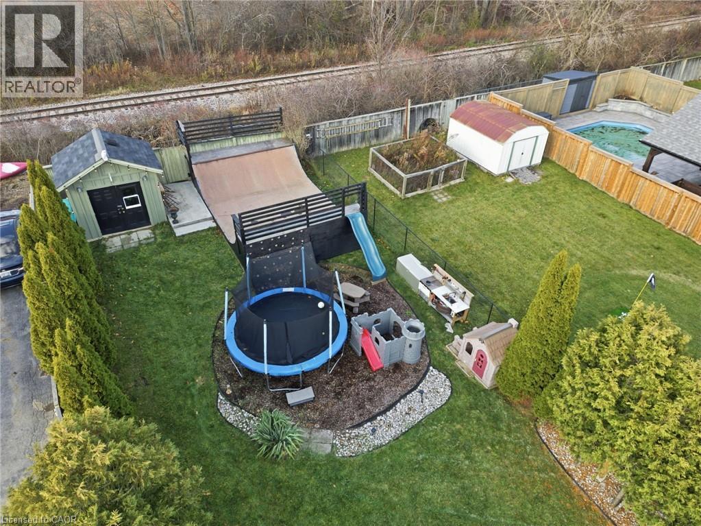 Drone / aerial view of a pool area - 136 Braemar Avenue, Caledonia, ON - Outdoor