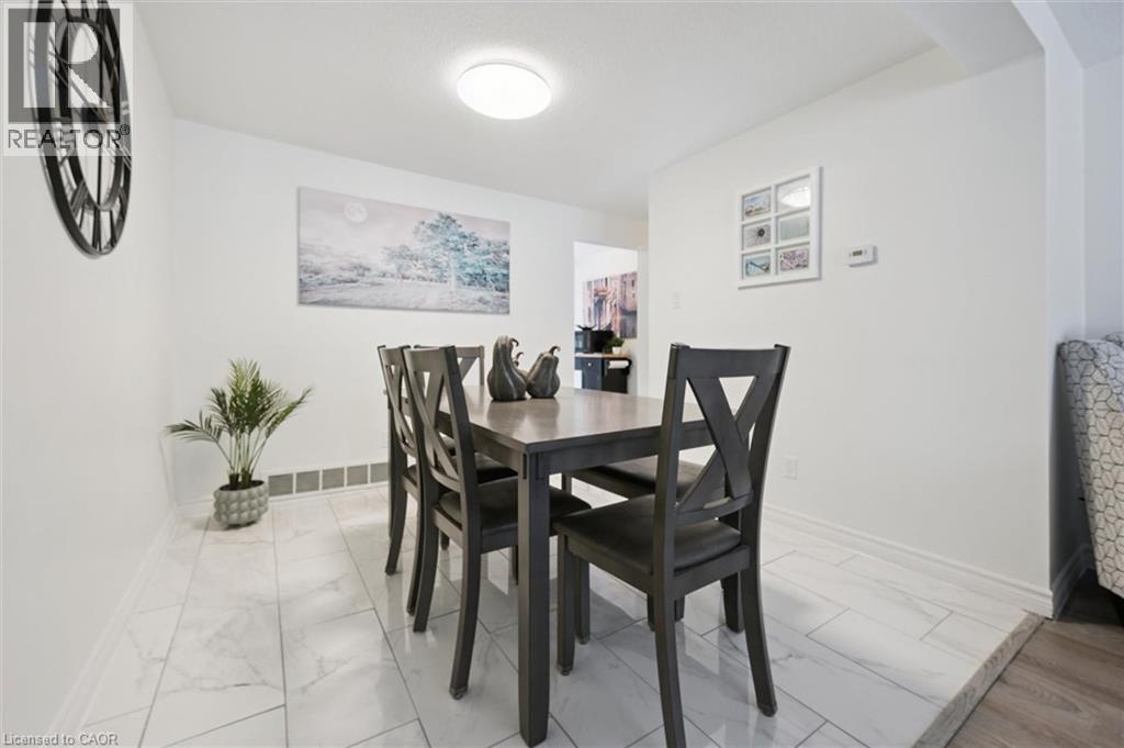 Dining space with light marble finish flooring - 11 Ingleside Drive, Kitchener, ON - Indoor Photo Showing Dining Room
