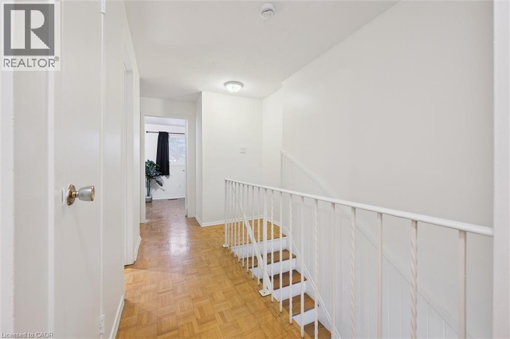 Hall with an upstairs landing and baseboards - 11 Ingleside Drive, Kitchener, ON - Indoor Photo Showing Other Room