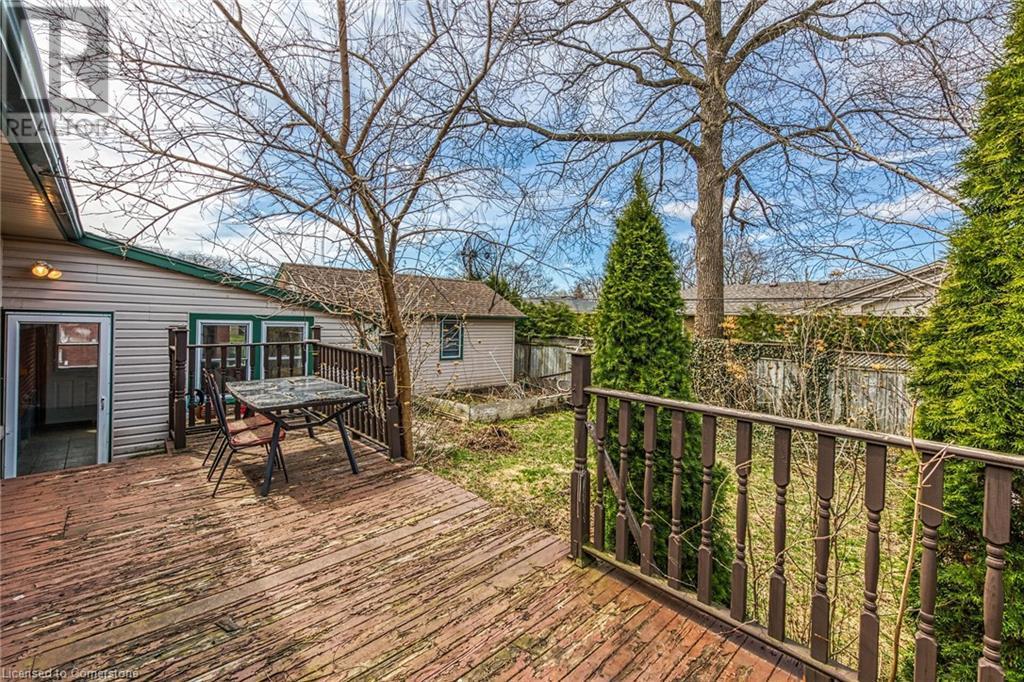 Wooden deck with outdoor dining space - 9 Gavin Drive, St. Catharines, ON - Outdoor