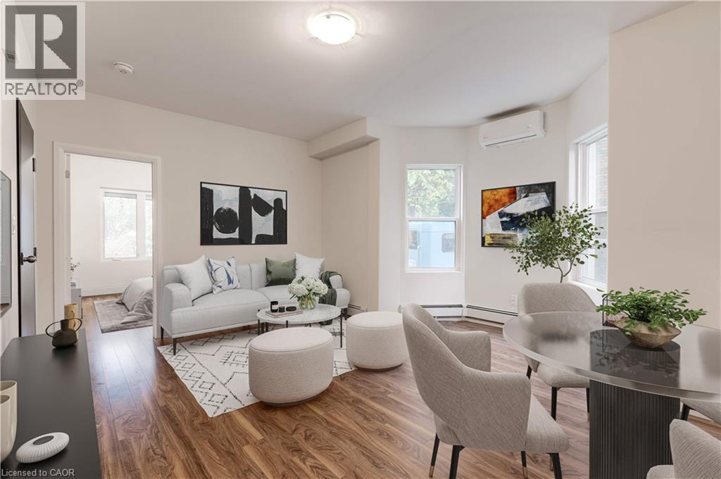 Staged Main Floor Unit - 152 Sanford Avenue S, Hamilton, ON - Indoor Photo Showing Living Room
