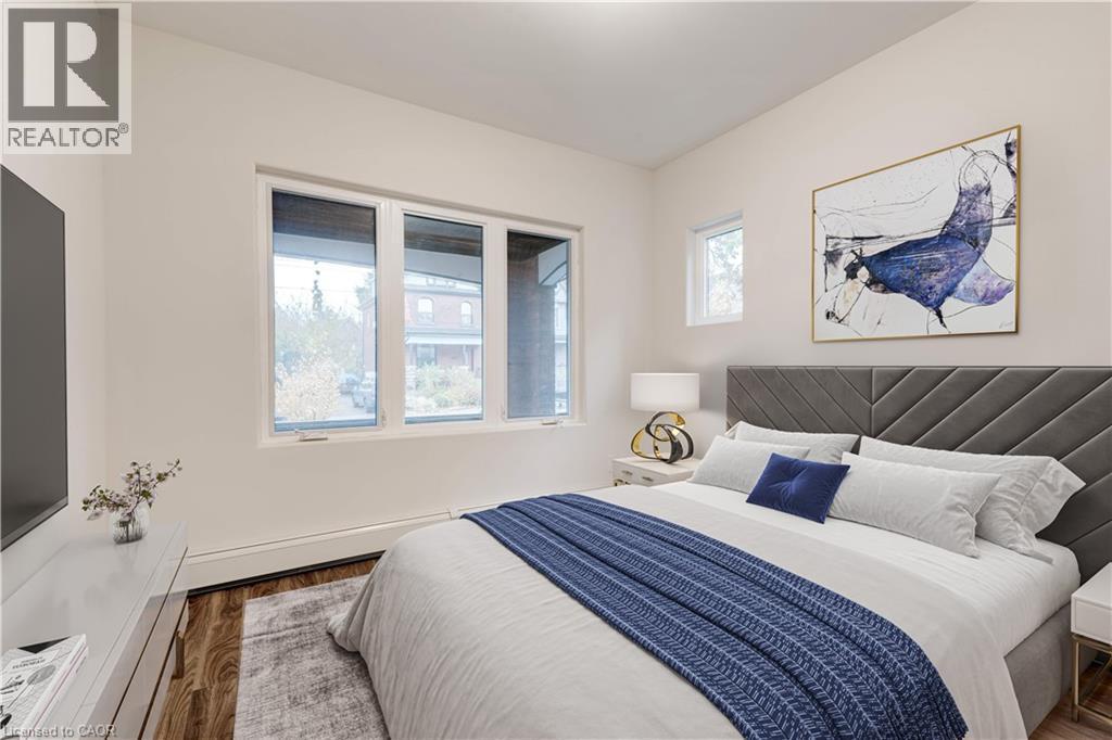 Staged Main Floor Unit - 152 Sanford Avenue S, Hamilton, ON - Indoor Photo Showing Bedroom