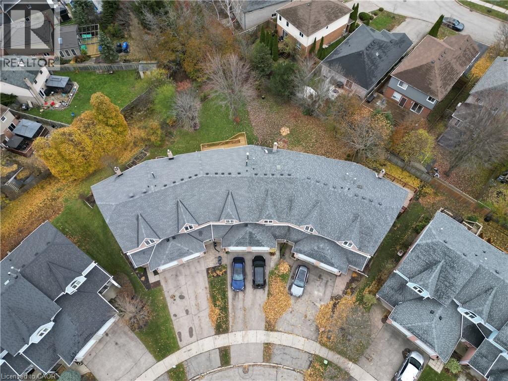 Top down aerial overview of property's location featuring nearby suburban area - 511 Oakvale Drive Unit# 1, Waterloo, ON - Outdoor With View