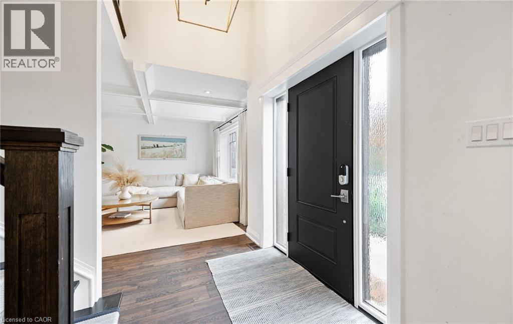 Entryway with dark wood-style floors, coffered ceiling, and beam ceiling - 735 George Street, Burlington, ON - Indoor Photo Showing Other Room