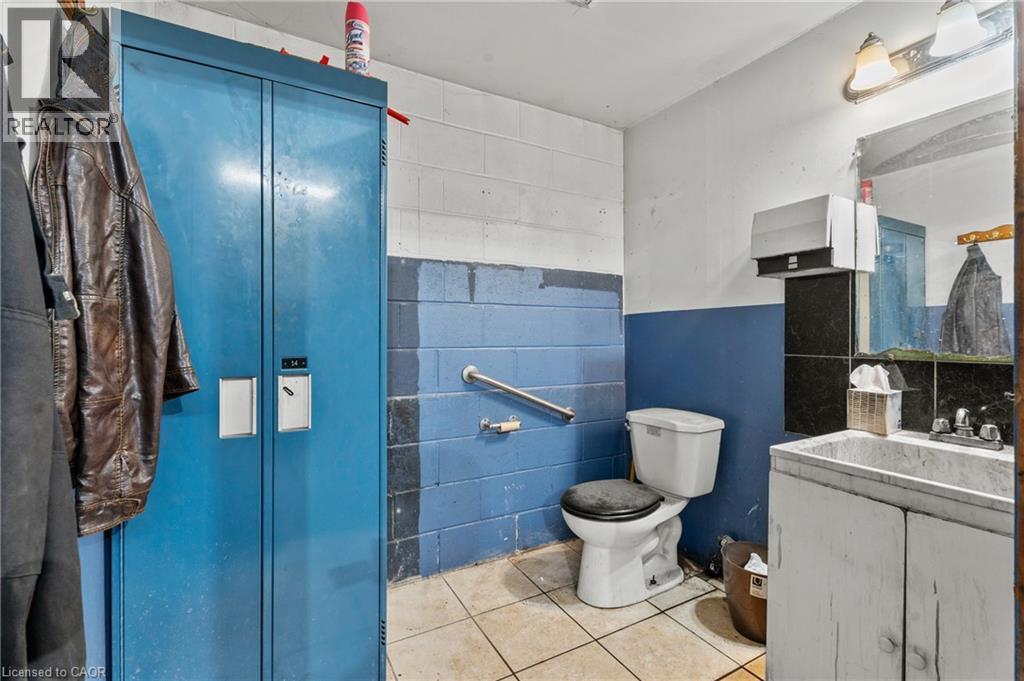 Bathroom with a stall shower, tile patterned floors, and vanity - 246 Mary Street, Hamilton, ON