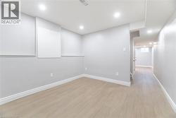 Unfurnished room featuring light wood-style floors and recessed lighting -