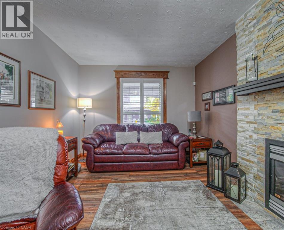 81 Beechwood Avenue, Hamilton, ON - Indoor Photo Showing Living Room With Fireplace