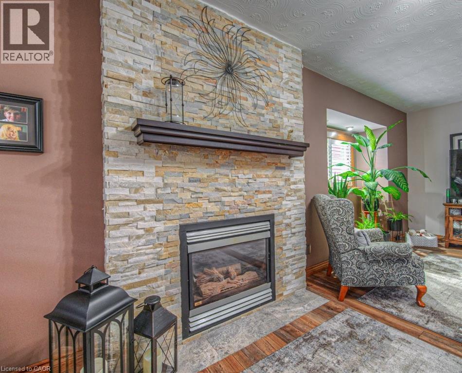 81 Beechwood Avenue, Hamilton, ON - Indoor Photo Showing Living Room With Fireplace