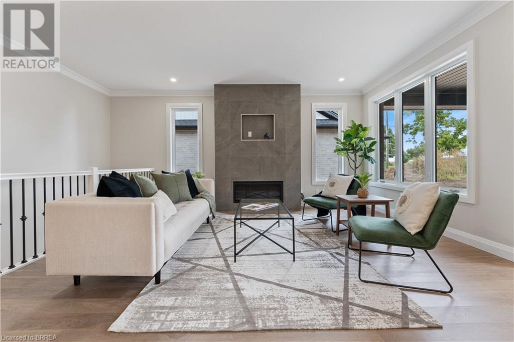 107 Judd Drive, Simcoe, ON - Indoor With Fireplace